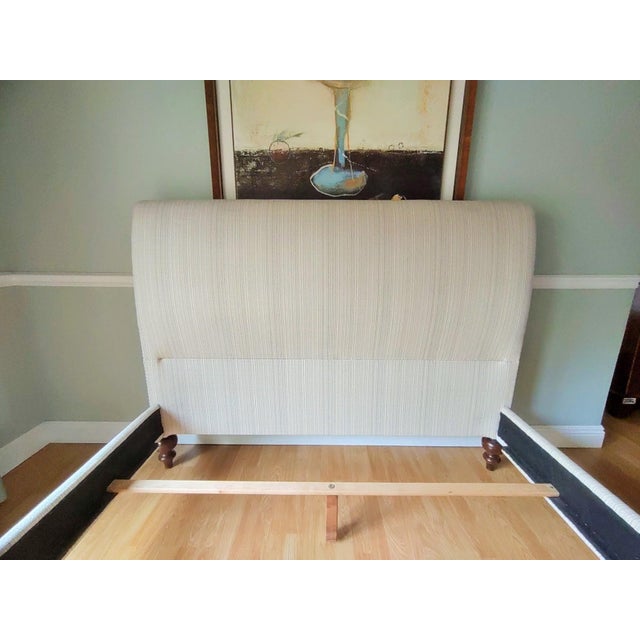 This gorgeous newly custom upholstered queen bed frame is one of a kind. It is upholstered in a beautiful heavy duty...