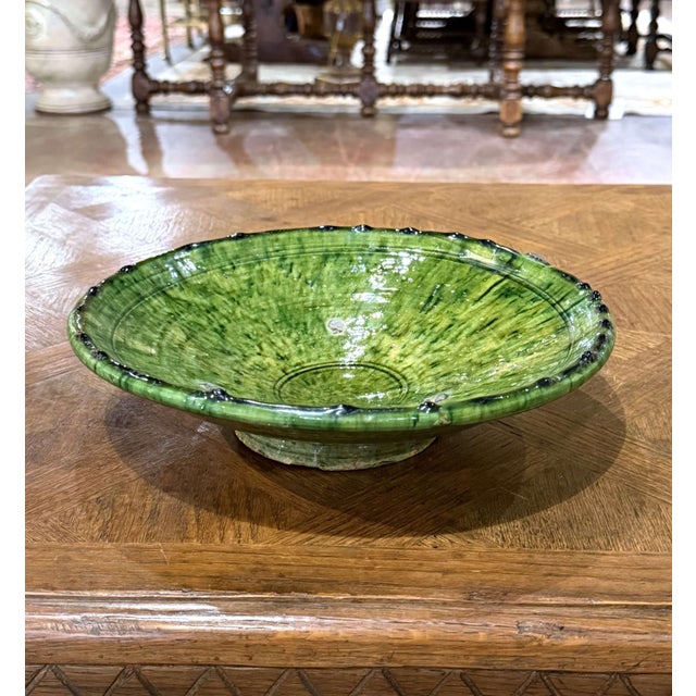 Colorful and full of rustic character, this vintage French pottery bowl was crafted in Provence circa 1960. Made of hand-...