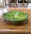 Colorful and full of rustic character, this vintage French pottery bowl was crafted in Provence circa 1960. Made of hand-...