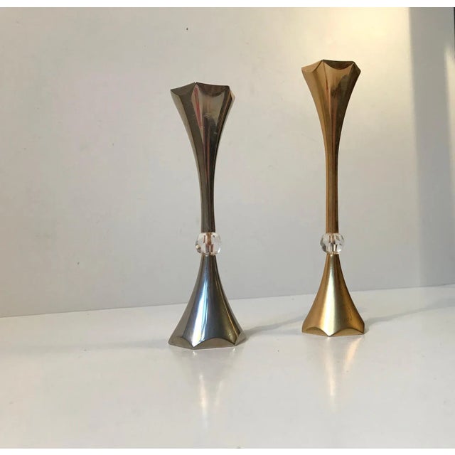 - A pair of 24-carat gold-plated candleholders with faceted crystal beads - One is in yellow gold plating and one in white...