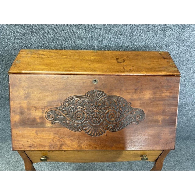 Bring a touch of classic French elegance to your workspace with this exquisite 19th-century fall-front secretary desk....