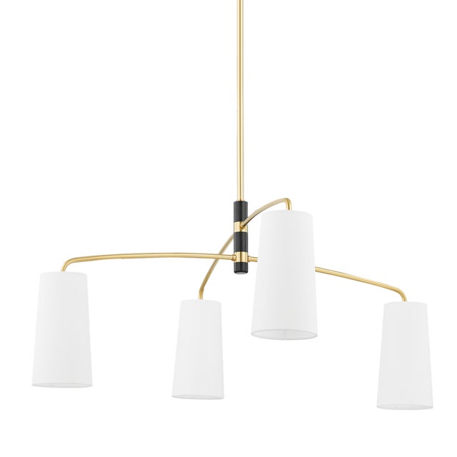 Evelyn exudes understated elegance. Crisp white linen shades hang from mobile-style arms that have a subtle bow to them,...