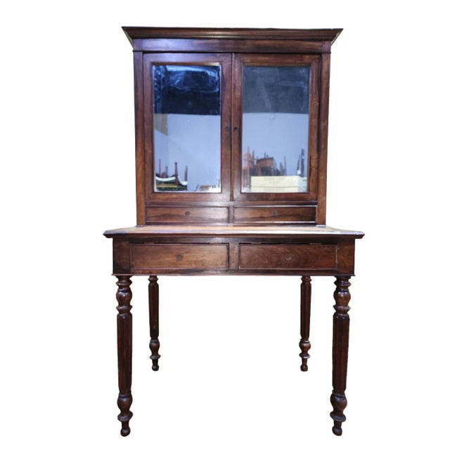 Fantastic rare example of an early 1900s Dutch solid rosewood wiriting desk with mirrored cabinet atop. Original leather...