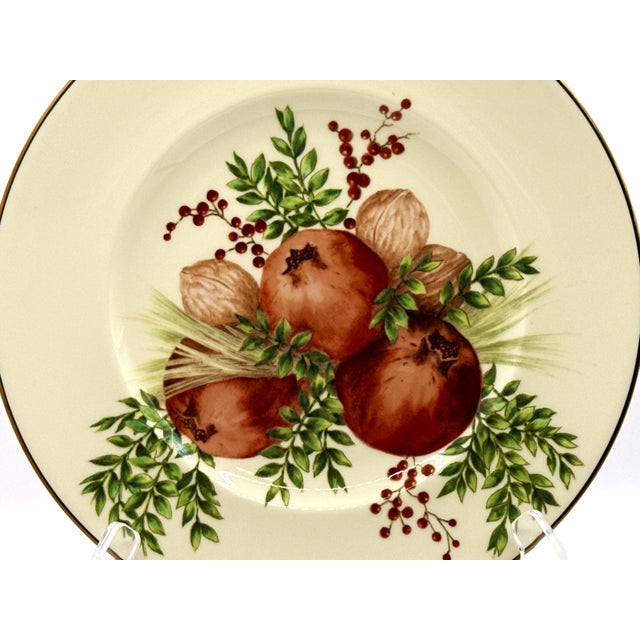 Williamsburg Boxwood & Pine (Pomegranate motif) 9 3/8" Luncheon Plate made by Lenox, featuring an ivory-cream porcelain...