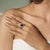 This contemporary Black Star and zircon halo ring is crafted in 925 sterling silver, featuring a 10 mm centerpiece with a...