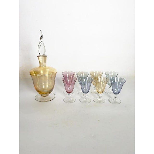 The glasses are 7 cm in diameter and 10.5 cm high. The decanter is 13 cm in diameter and 32 cm high. A beautiful blown-...