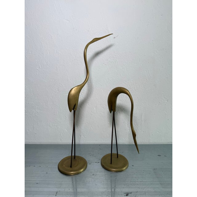 Mid-Century Brazilian sculptures of two herons circa 1960s. Dimensions: Large - w3.25” d7” h14.75” Small - w3.25” d4.5” h9.5