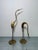 Mid-Century Brazilian sculptures of two herons circa 1960s. Dimensions: Large - w3.25” d7” h14.75” Small - w3.25” d4.5” h9.5