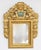 Beautiful mirror, carved wood and gold leaf. It has a miniature painting of a boat . the carving is beautiful and the...