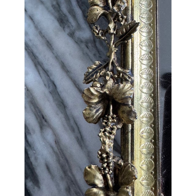 Here is a vanity mirror or coastal motif centerpiece plateau for your table. Featuring a hibiscus motif gold filigree...