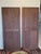 A striking pair of vintage carved‑wood wardrobe mirrored doors, that can be used as wall or floor mirrors. They feature...