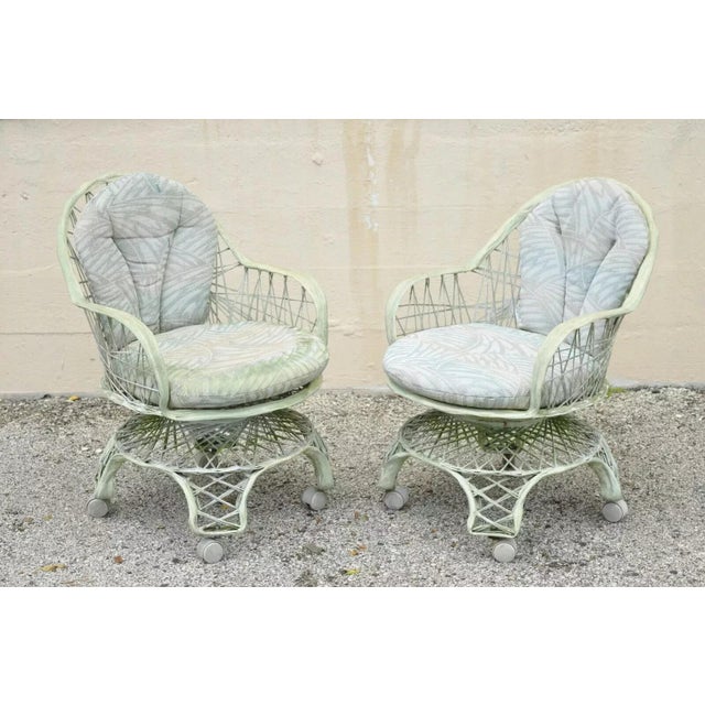 Vintage Russell Woodard Woven Spun Fiberglass Swivel Rolling Club Lounge Chairs and Ottoman. Item features a woven spun...
