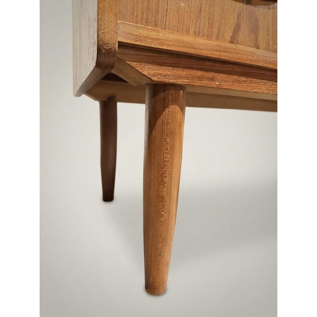 Discover the perfect blend of form and function with this beautiful Danish secretary desk from the 1970s. This piece is a...