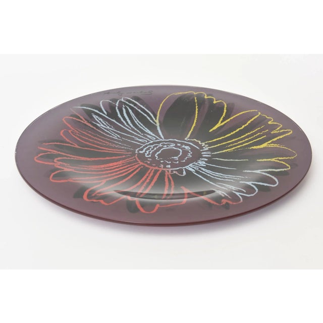 This iconic blown glass plate designed by Andy Warhol and produced after Andy Warhol for Rosenthal is from the 1980s. it...