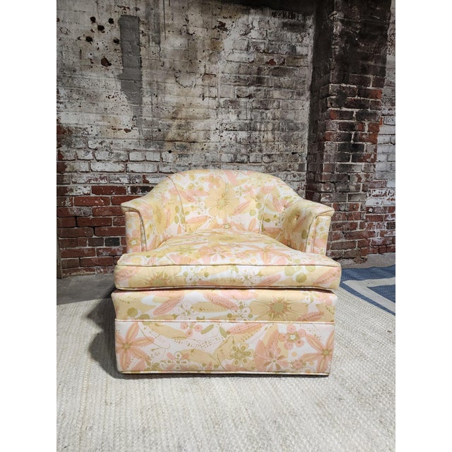 Beautiful original floral pattern fabric on this Milo Baughman style swiveling chair. no rips or stains. very comfortable.