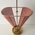 An elegant and highly sculptural mid-century modern umbrella stand from the 1950s, attributed to the iconic French-...