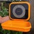 Orange wall mounting EKS kitchen scale by EKS of Sweden. The scale weighs up to 3 kilograms with 25 gram increments. The...