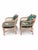 A delightful pair of vintage Henry Link wicker lounge chairs in their original blush pink finish. These substantial, well-...