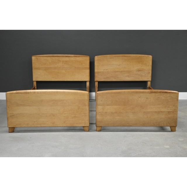 A pair of mid century modern solid birch twin size beds by Heywood Wakefield. Made in USA. Circa 1950’s. Professionally...
