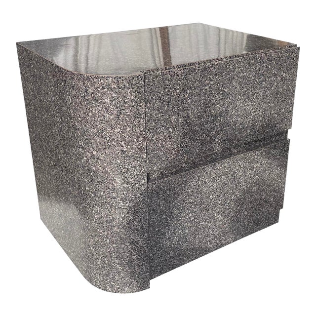 Contemporary nightstand with dark gray laminate finish.