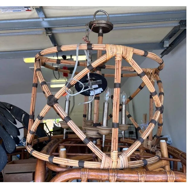 Coastal modern rattan chandelier. Chippendale pattern lends a touch of charm to this otherwise natural chinoiserie style....