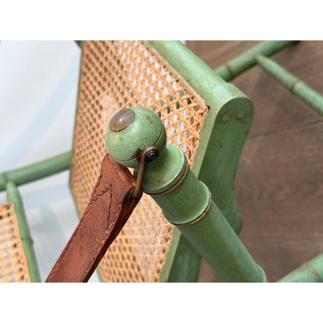Pair of 1970s folding safari chairs in weathered faux bamboo with caned backs and seats For Sale - Image 11 of 12