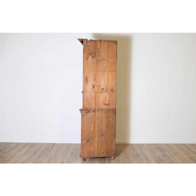 This striking 19th-century Swedish corner cabinet, circa 1830, hails from the region of Dalarna, renowned for its rich...