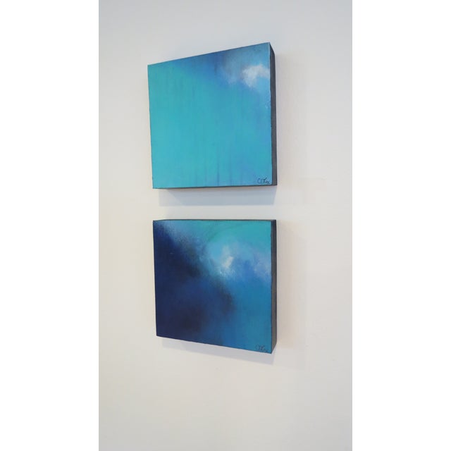 Canvas mounted on thick edge wood frames. Titled Atmospheres I & II. Each 8" square and 1.75 deep, but has a big visual...