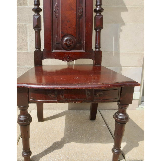 Ecclesiastical Chair, Walnut Renaissance Revival Fine wood with high polish. The chair is classic ecclesiastical, with a...