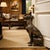 A striking blend of elegance and symbolism, this 21-inch cast metal dog statue captures the refined silhouette of a...