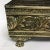 Circa 1950 embossed brass rectangular planter with paw feet.