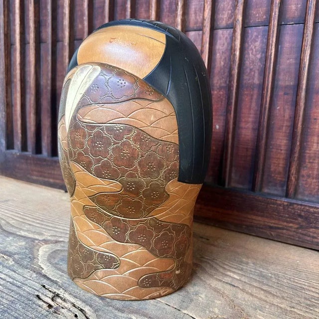 Rare creative kokeshi made by Yoshida Takashi 吉田 多加志 (1948-2007). Beautiful wood carving of plum blossoms on the kokeshi's...