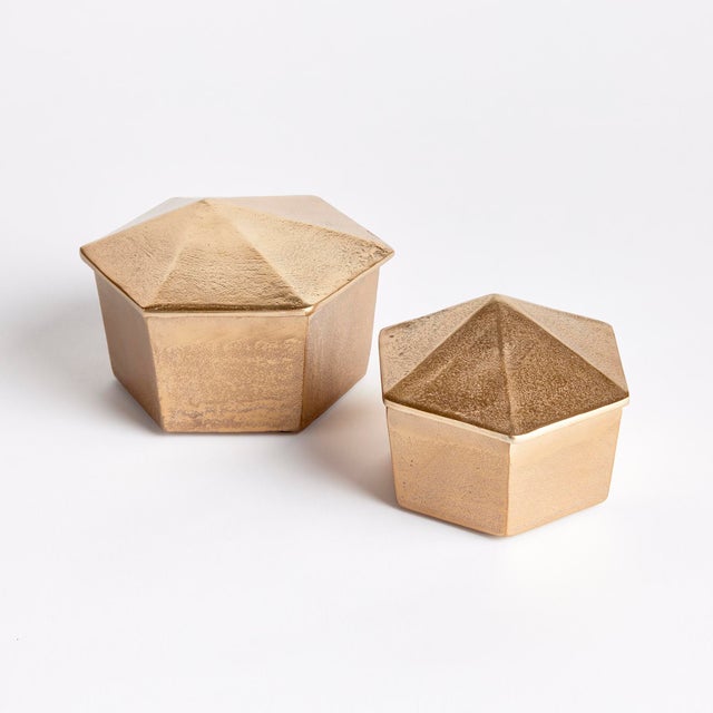 This set of lidded boxes is a bit off, by design. The lids are off pitch which makes for a unique and unusual look. Great...