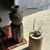 Side table in black petrified wood with beige streaks on the white side. Petrified wood is a fossilized wood (from the...