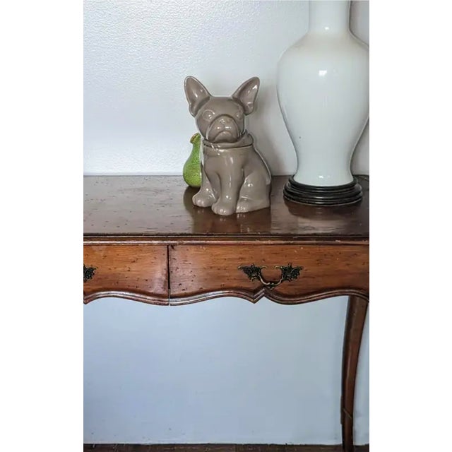 Threshold ceramics, the French Bulldog. This shiny new looking taupe cookie jar follows the trend of popular breeds.