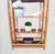 A wonderful tall vintage Brighton Pavillion style bamboo etagere shelving unit. This is a spectacular piece with beautiful...