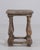 A 20th century French pedestal table crafted in wood, featuring turned legs connected by a shaped stretcher base. The...