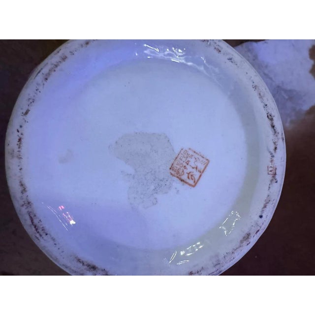 Vintage Chinese Blue and White Floral Vase Decorate your mantlepiece with this flower and branch Chinese vase, painted in...