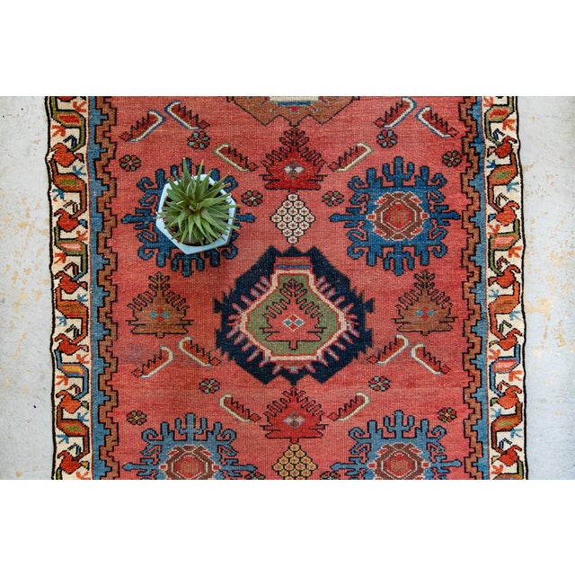 ✂ - - - - - m e a s u r e m e n t s: 2’11” x 4’8”, 88.9cm x 142.24cm, 5.25 Lbs C O L O R S Base: salmon Accents: red,...