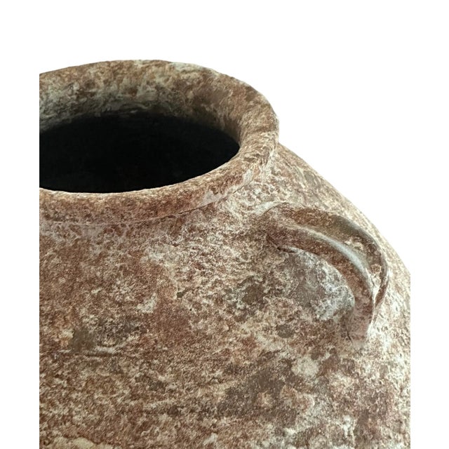 This vintage handmade terracotta pottery vase carries decorative accents of time and use giving each it's own distinctive...