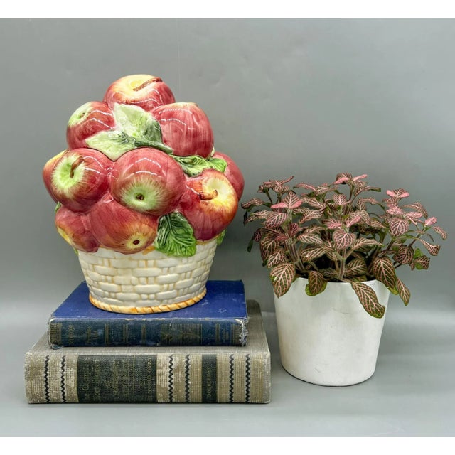 Charming, vintage cookie jar in the shape of a basket of honeycrisp apples. Lovely piece that is sure to be a focal point...