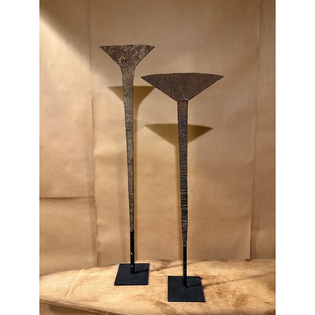 Antique African artifact on custom made metal stand Hand forged metal originally used as a currency in Nigeria around mid...