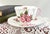 This Dainty Shape Shelley tea cup is decorated in the pink Oleander pattern (No. 13883). Made of fine English bone china,...