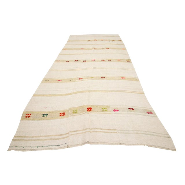 Handwoven vintage hemp kilim rug from Yozgat region of Turkey. Approximately 50-60 years old. In very good condition.