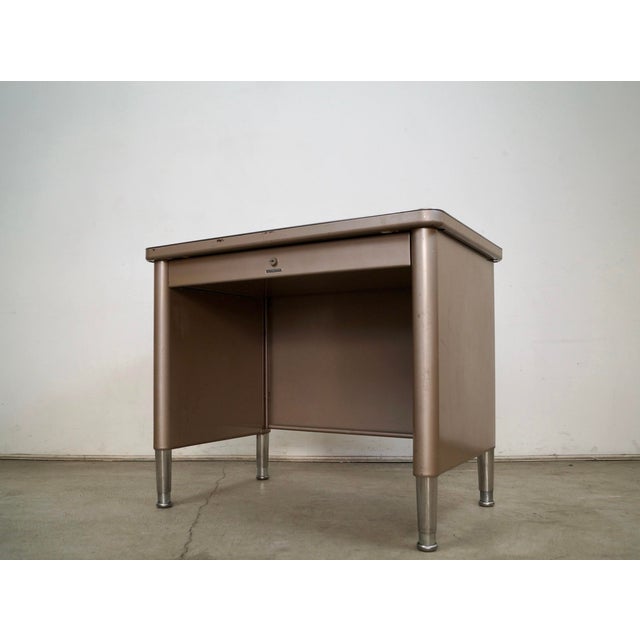 Vintage 1950's Mid century Modern tanker desk for sale. It's an original tanker desk by Steelcase, and is very unique. It...