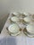 An elegant set of 9 antique Haviland & Co. Limoges double-handled bouillon cups with matching saucers, finished with hand-...