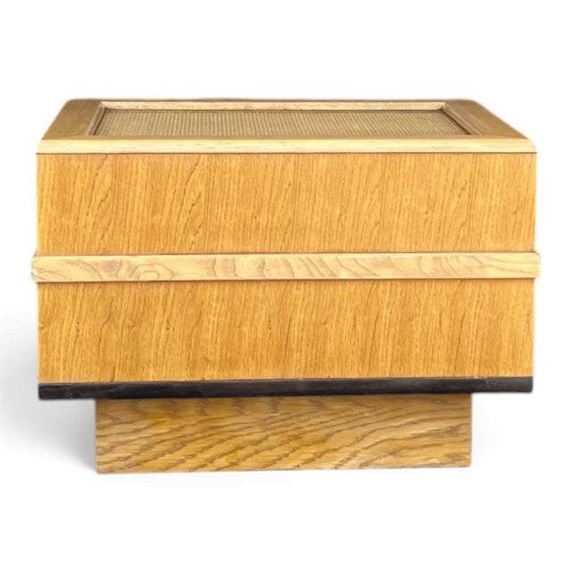 Expertly restored, this striking pair of vintage oak end tables blends clean architectural design with the warmth of...