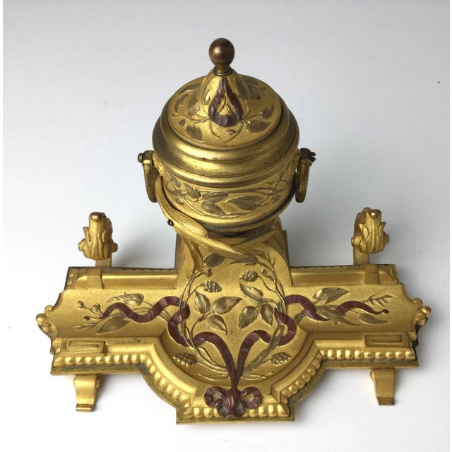 Beautiful mid-19th century gilt bronze French inkwell. Measures: 6 1/2' wide by 4" deep by 4 3/4" tall.