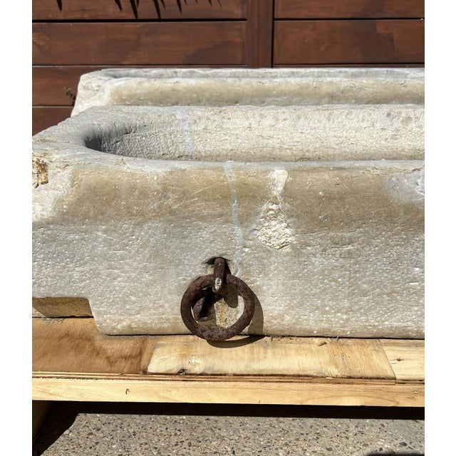 This charming limestone trough from the 1800s was used to provide feed or water to livestock on a French property in...