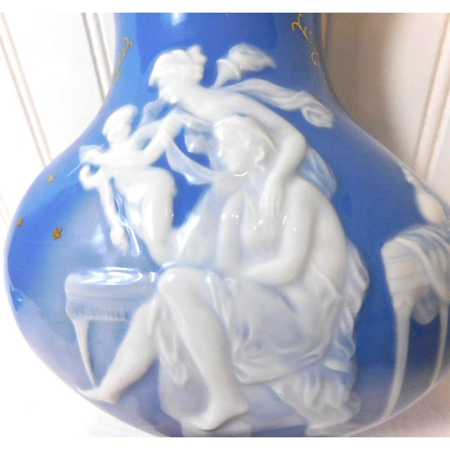 A truly exceptional Lenwile Ardalt porcelain garden planter, executed in pâte-sur-pâte technique, showcasing delicate...